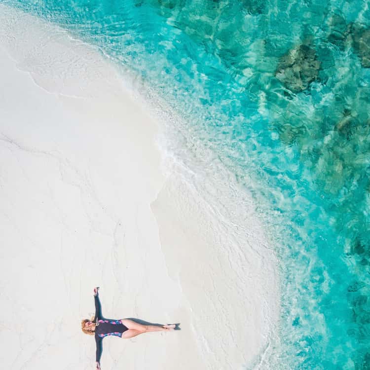 Sunbathing on pristine beach