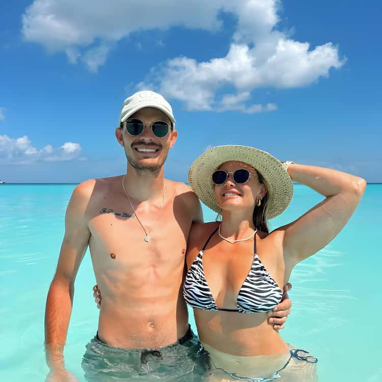 Couple in turquoise water