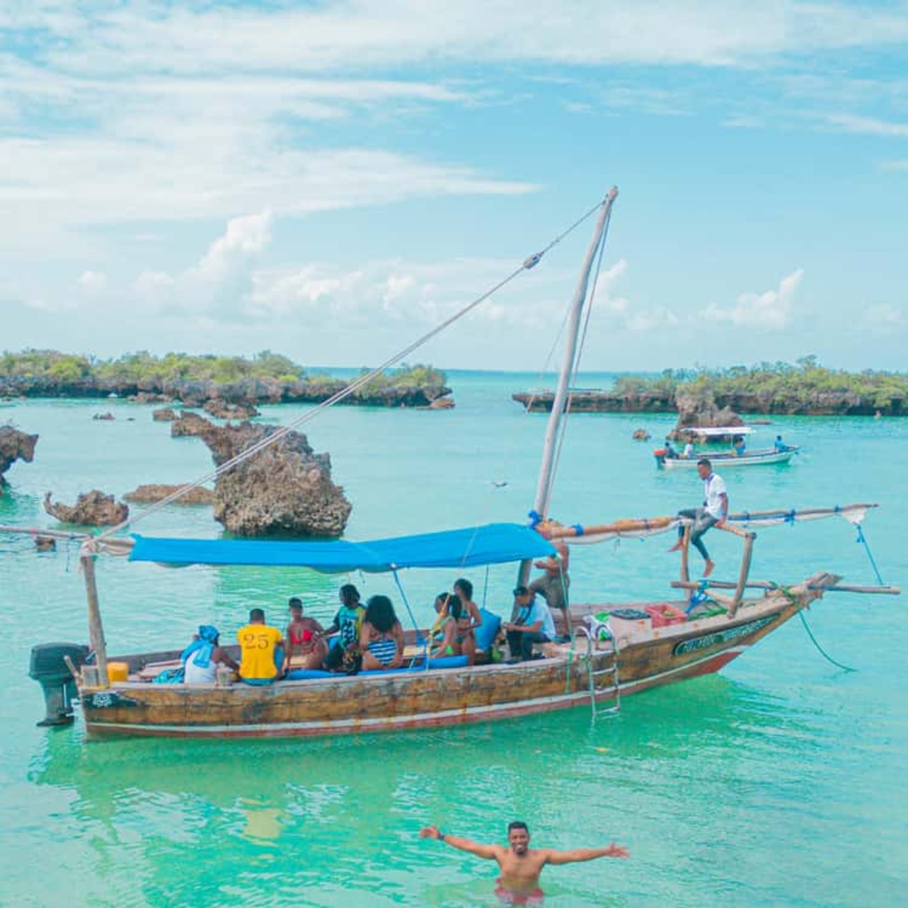 Dhow at rocky islets