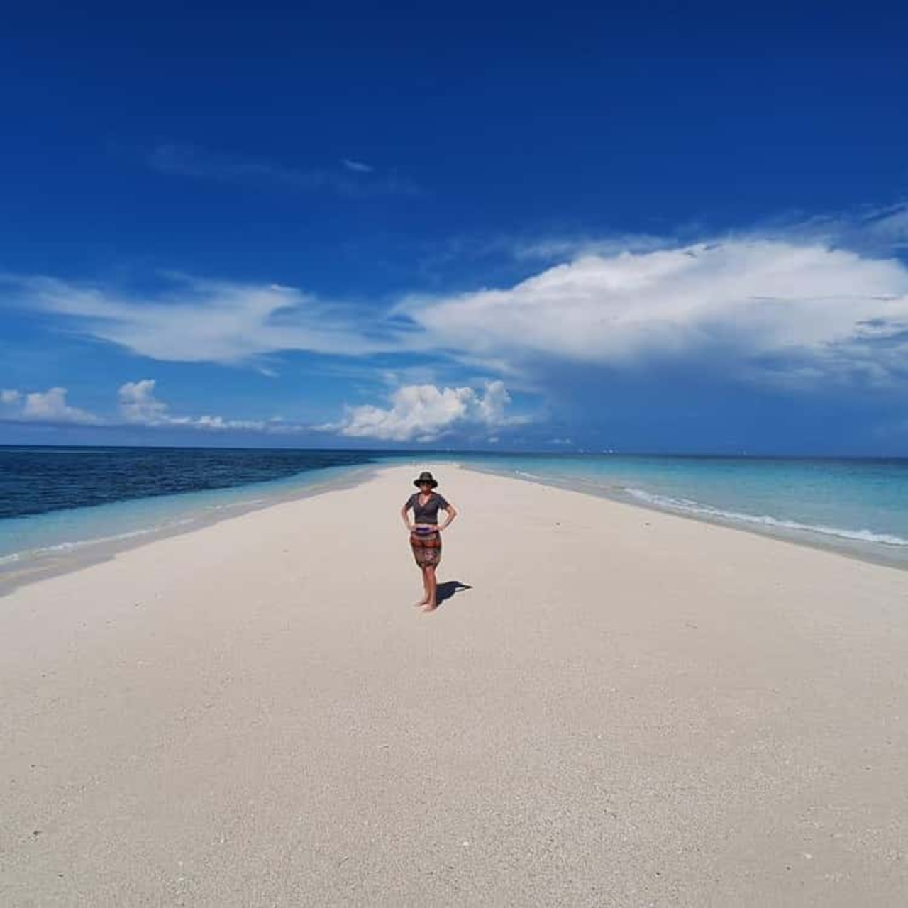 Standing on a sandbar island